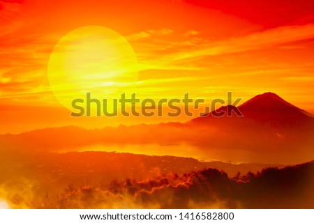 African landscape with mountains silhouettes and sunset