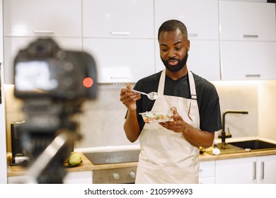 African Male Blogger Recording Vlog On Digital Camera