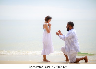 An African male making a wedding  proposal to his lover.