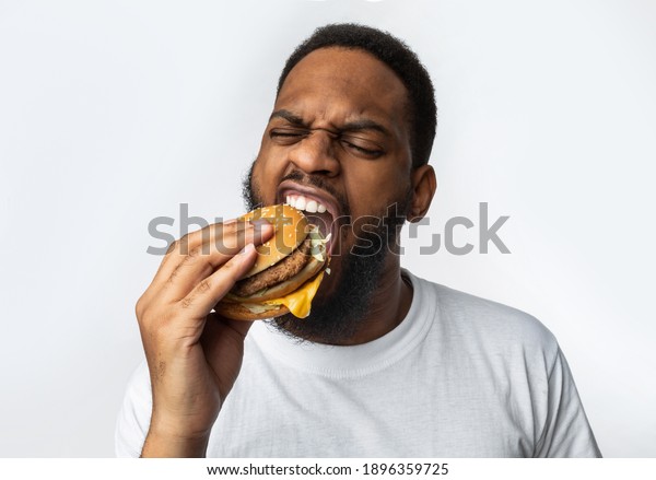 Black Man Eating Burger Stock Photos Images Photography Shutterstock