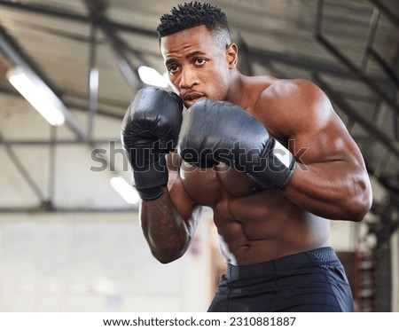 African man, boxing and punch in gym for fitness, focus or training for growth, goal and wellness for competition. African guy, boxer and gloves for exercise, wellness or martial arts club for sports
