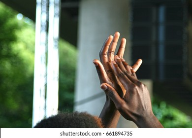 African Man Clapping Hands At An Open-air-concert