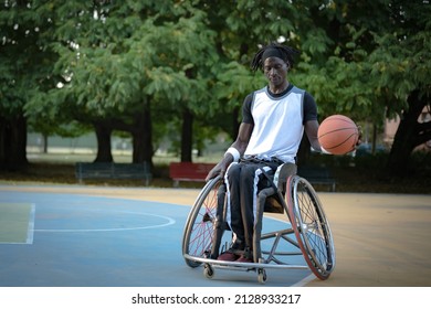 African Man With A Disability Caused By Polio Playing Basketball, Champion Athlete On Wheelchair, Concept Of Determination And Mental Toughness, Accessibility And Diversity