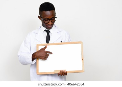 African Man Doctor Holding Empty White Board