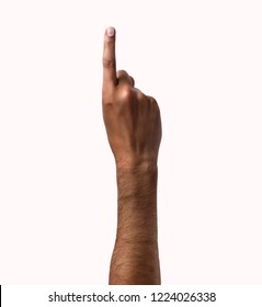 African Man Hand Showing Forefinger Up Tossing A Coin Isolated On White