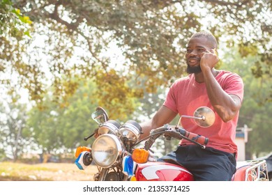 African Man On Bike Making Phone Stock Photo 2135371425 | Shutterstock
