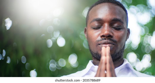 African Man Praying Thank God Light Stock Photo 2035788689 | Shutterstock