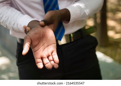 African Man Suffering From Wrist Or Hand Pain, Sick Black Man With Cps Wrist Pain, Trigger Finger, Bone Arthritis, Gout Symptoms, Sickness, Health Care Or Pain Concept