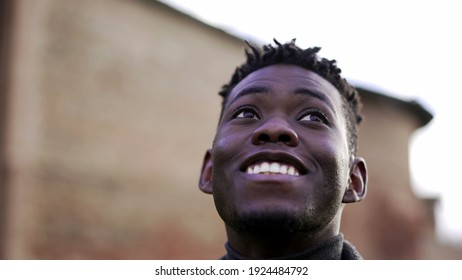 African Man Taking A Deep Breath Outside At Park. Close-up Person Meditating