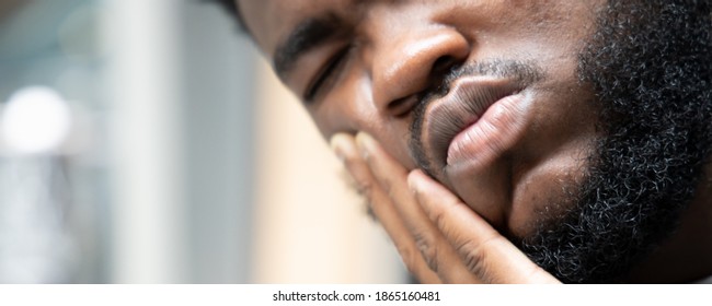 African Man With Toothache; Portrait Of Black Man Suffering From Toothache Pain, Tooth Decay, Tooth Sensitivity; Girl Oral Health Care, Dental Care Concept; African 20s Adult Man Model