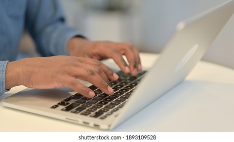 African Man Typing On Laptop Keyboard, Close Up 