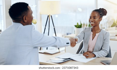 African man, woman and handshake at interview, recruitment and hiring with agreement for job in office. Human resource expert, black business owner or manager with smile, shaking hands and onboarding - Powered by Shutterstock