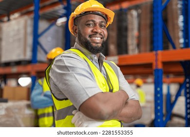 African men worker wearing working suite dress and safety helmet at cargo for stack item for shipping.female worker checking the store factory. industry factory warehouse. Inspection quality control. - Powered by Shutterstock