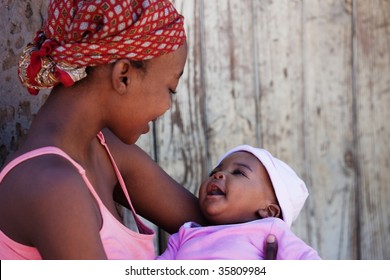 African mother with baby girl, location Mmankgodi village , Botswana - Powered by Shutterstock