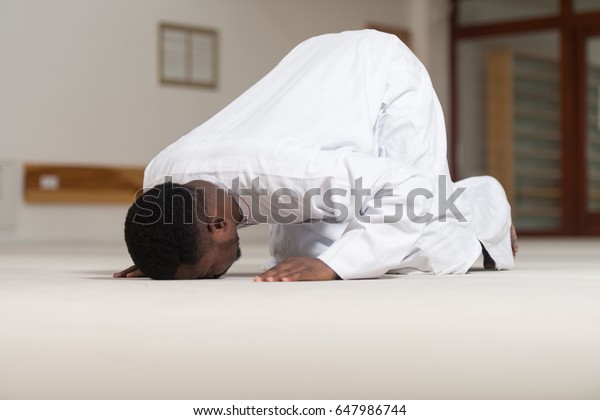 African Muslim Man Praying Mosque Stock Photo (Edit Now) 647986744