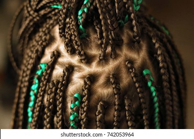 African pigtails close-up of plaits for braids, hair roots attached to a pigtail, division into segments of the head