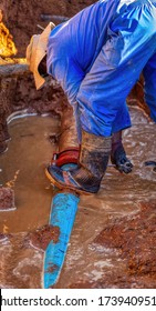 African Repairman Attending To The City Water Supply Repairs In Gaborone Botswana