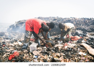 African Slum Children Who Work In A Landfill To Make A Living; Informal Waste Management; Recycling Economy Concept