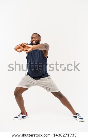 Similar – Black man practicing yoga in urban background.