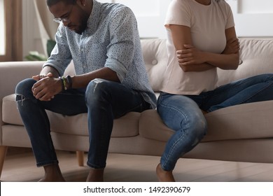 African spouses not talking after dispute feels anxious, people thinking over problems in relationships married couple on the verge of separation need counsellor for prevent divorce, break up concept - Powered by Shutterstock