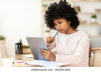 African Teen Girl Doing Homework Using Stock Photo (Edit Now) 1813911641