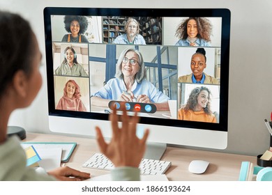 African Teen School Girl College Student Distance Learning During Virtual Distance Class, Online Lesson On Video Conference Call With Teacher And Classmates Group On Computer Screen Studying At Home.