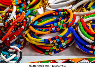 African tribal necklaces. Closeup of intricate bead work for sale at a street market. 
