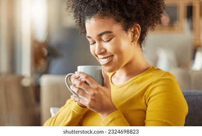 African woman, coffee and smile on sofa with scent, flavor and energy to start morning in apartment. Girl, happy and drink to relax with tea, matcha or espresso with smell, thinking and mug in house - Powered by Shutterstock