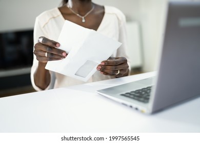 African Woman Holding Mail Or Postal Letter