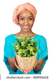 African Woman Holding Plant In Vase