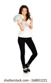 African Woman Holding Polish Money With Thumbs Up.