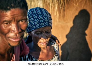 African Woman And Man In Rural Africa, Village In Botswana, Pain And Sorrow