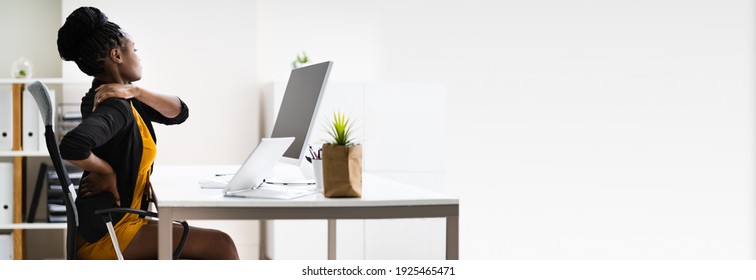 African Woman With Pain Back Bad Posture Problem In Chair