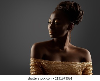 African Woman Silhouette. Dark Skin Beauty Model With Golden Make Up Profile Side View Over Gray. Fashion Girl Face Portrait With Afro Braids Hairstyle In Glitter Golden Dress In Backlight