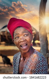 African Woman Wonder In Disbelief In The Yard Of Her Village In Botswana