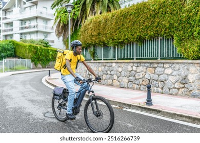 African young delivery man on duty in a residential area riding a bicycle and delivering carrying a backpack - Powered by Shutterstock