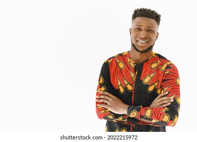 African young man posing against white wall