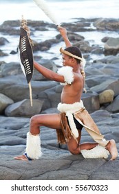 african zulu man on beach