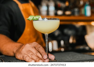 African-American bartender preparing cocktails at the bar, at an afrobeats event. Nightlife, partying and bartending. Style. - Powered by Shutterstock