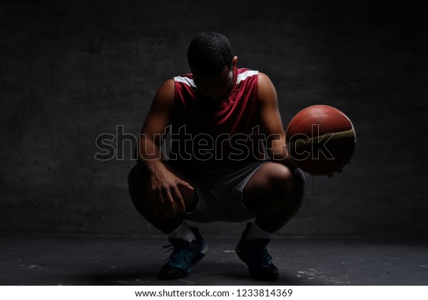 Africanamerican Basketball Player Sportswear Squatting Ball Stock Photo ...