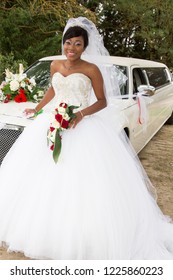 African-American Black Woman In White Wedding Dress With Limo Car