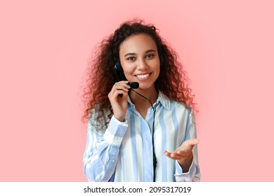 African-American Consultant Of Call Center In Headset On Pink Background