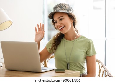 African-American Female Soldier Video Chatting With Family