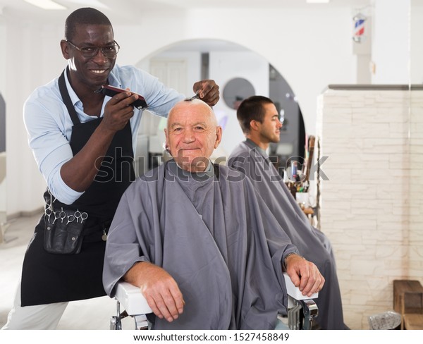 Africanamerican Hairdresser Doing Styling Grayhaired Man Royalty