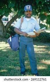 An African-American Mail Carrier On His Route, Santa Monica, CA