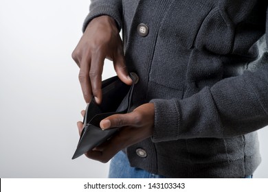 African-American man holding a wallet