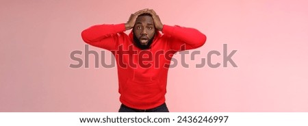 African-american man shocked speechless look upset stupor hold hands head drop jaw gazing dazed cannot believe lost all money, standing upset stunned pink background, receive terrible news.