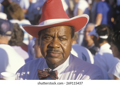 An African-American Man At The U.S. Senior Olympics Wearing A Red Cowboy Hat, St. Louis, MO