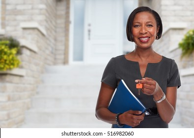 African-American Realtor Woman With Key.