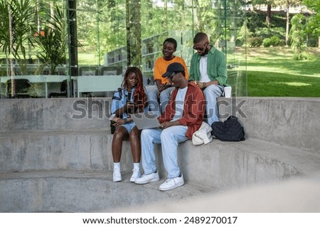 Similar – Image, Stock Photo Cheerful African American teenagers in denim outfits